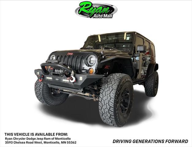 used 2013 Jeep Wrangler Unlimited car, priced at $16,996
