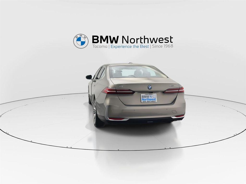 used 2024 BMW i5 car, priced at $59,997