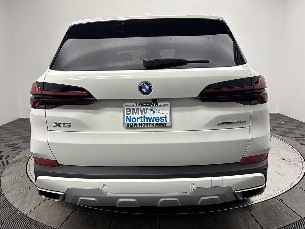 used 2025 BMW X5 PHEV car, priced at $59,597