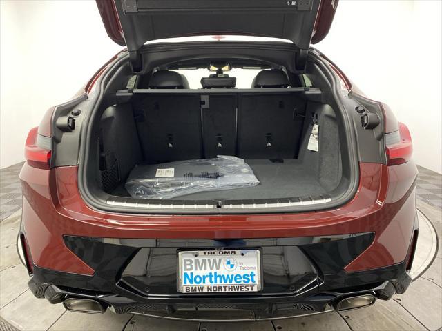 used 2025 BMW X4 car, priced at $58,997