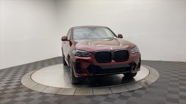 used 2025 BMW X4 car, priced at $58,997