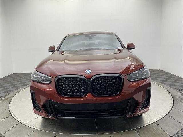 used 2025 BMW X4 car, priced at $58,997