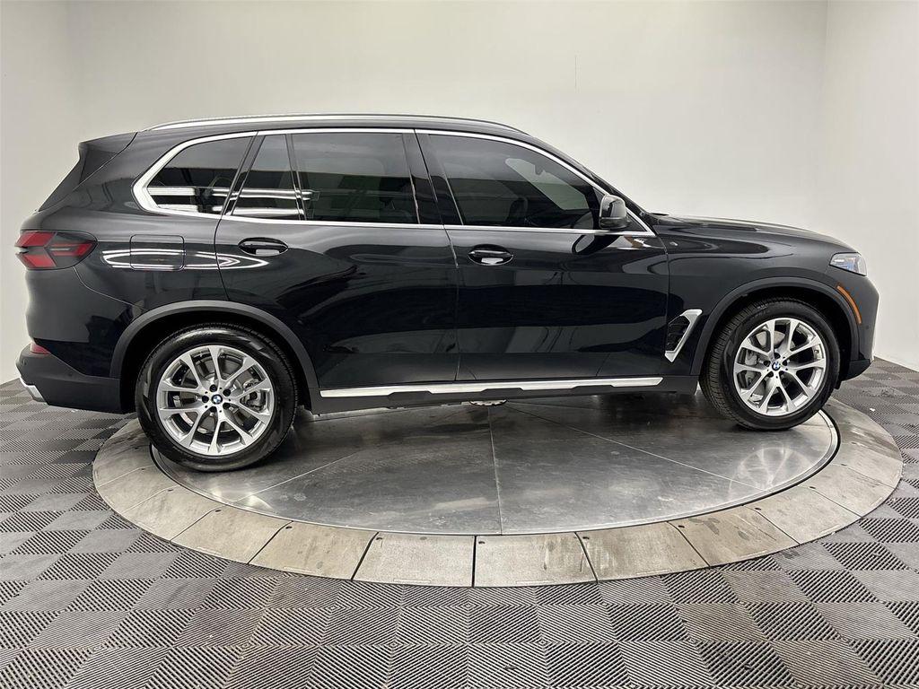 used 2026 BMW X5 PHEV car, priced at $70,797