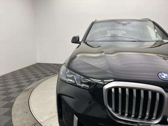 used 2025 BMW X5 PHEV car, priced at $66,997