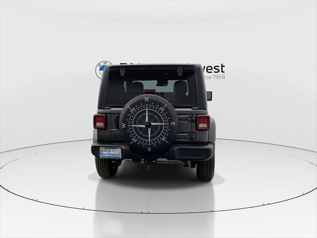 used 2024 Jeep Wrangler car, priced at $33,597