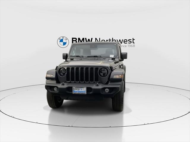 used 2024 Jeep Wrangler car, priced at $33,597