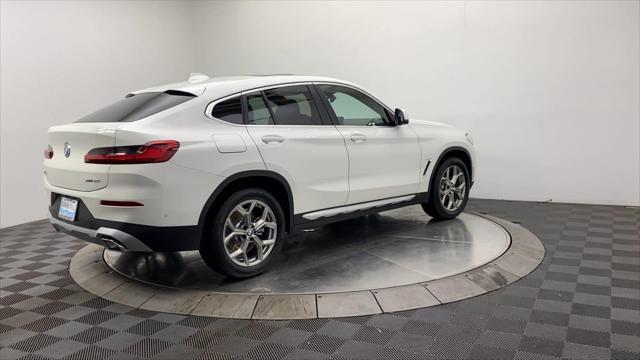 used 2025 BMW X4 car, priced at $55,297