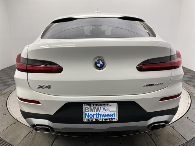 used 2025 BMW X4 car, priced at $55,797