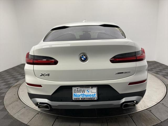 used 2025 BMW X4 car, priced at $55,297