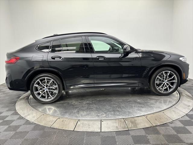 used 2022 BMW X4 car, priced at $37,997