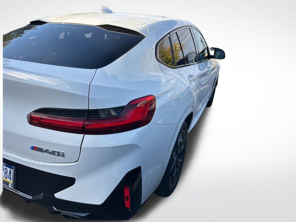 used 2025 BMW X4 car, priced at $58,500
