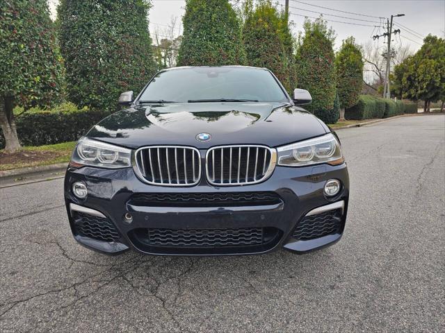 used 2018 BMW X4 car, priced at $22,499