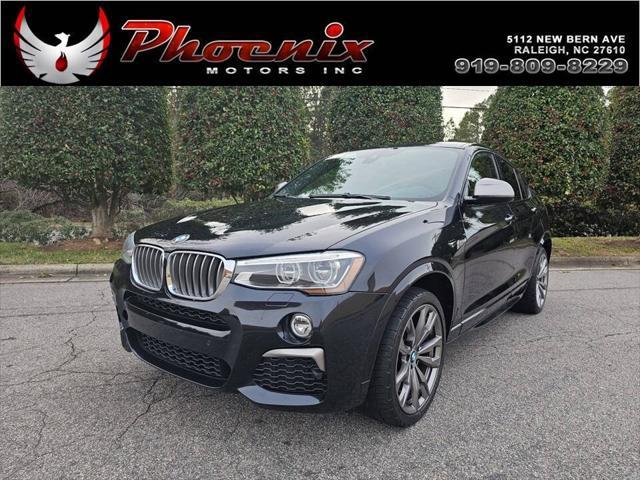 used 2018 BMW X4 car, priced at $22,499