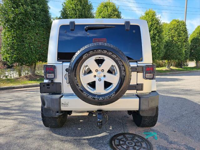 used 2012 Jeep Wrangler Unlimited car, priced at $15,999