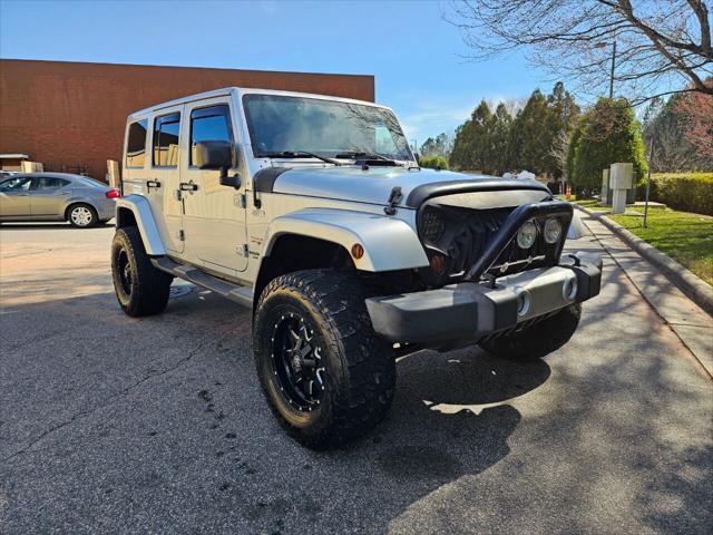 used 2012 Jeep Wrangler Unlimited car, priced at $15,999