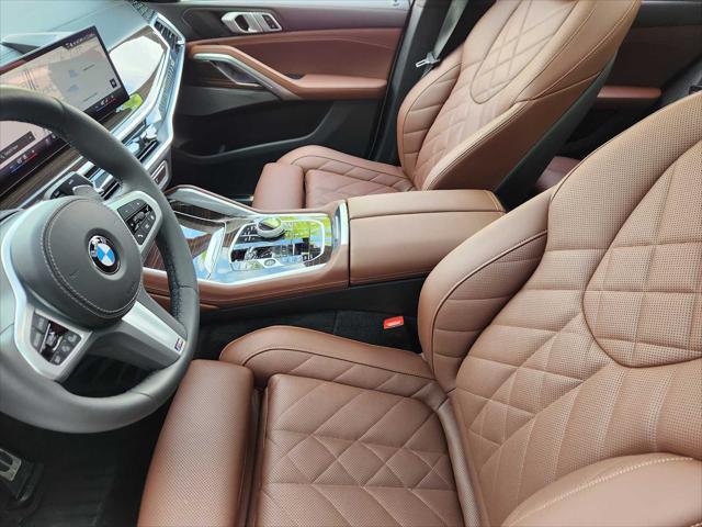 used 2025 BMW X6 car, priced at $76,991