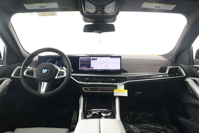 new 2025 BMW X6 car, priced at $77,875