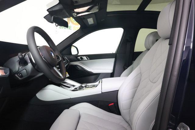 new 2025 BMW X6 car, priced at $77,875