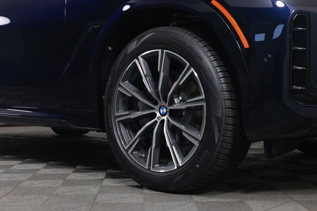 new 2025 BMW X6 car, priced at $77,875