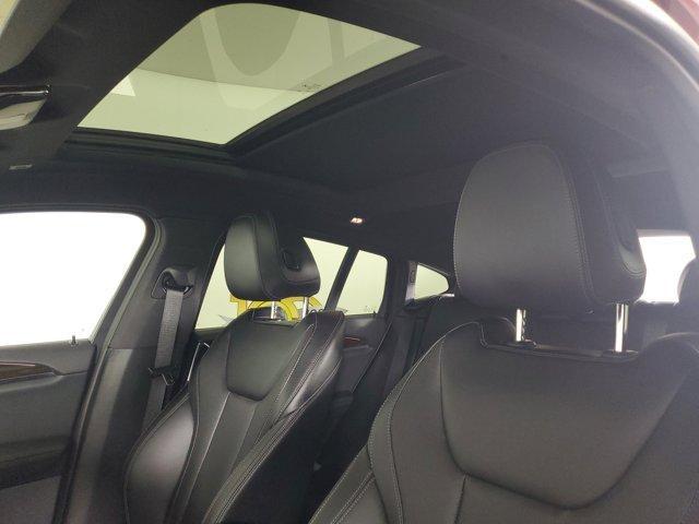 used 2025 BMW X4 car, priced at $50,000