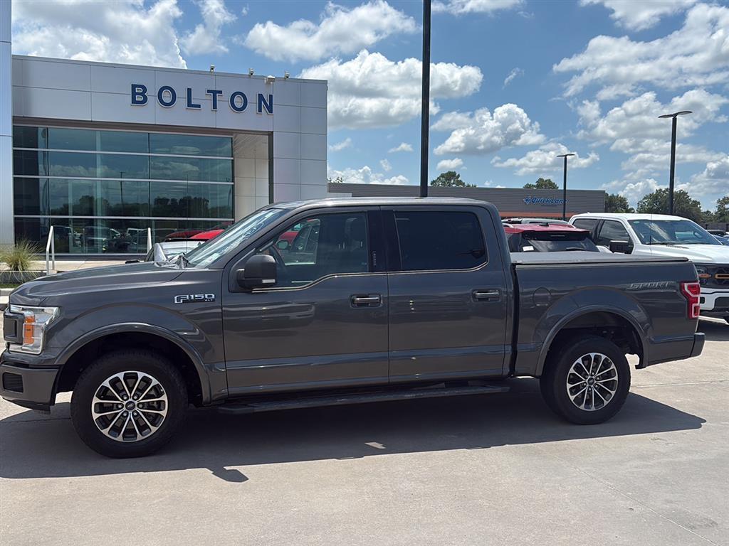 used 2018 Ford F-150 car, priced at $24,388