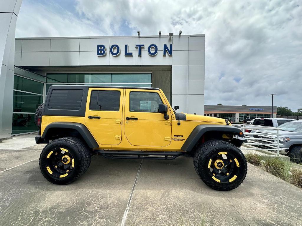 used 2015 Jeep Wrangler Unlimited car, priced at $20,488