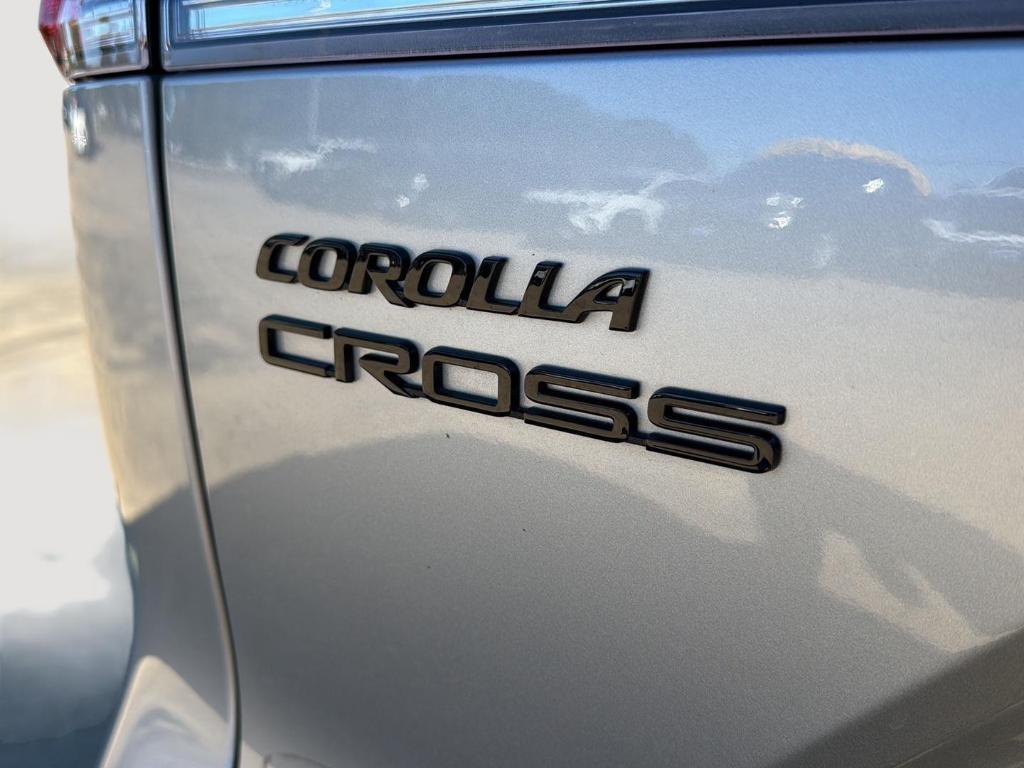 used 2024 Toyota Corolla Cross Hybrid car, priced at $31,388