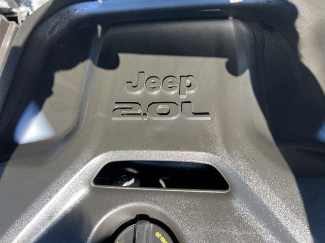 used 2024 Jeep Wrangler car, priced at $35,522