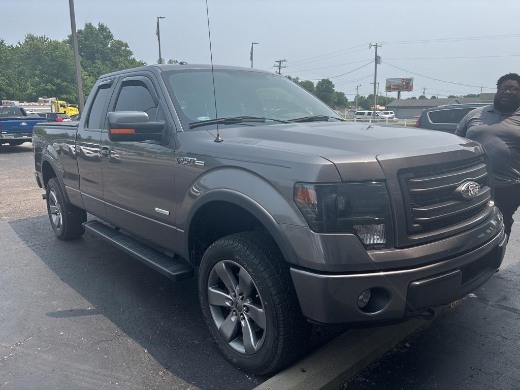 used 2014 Ford F-150 car, priced at $23,299