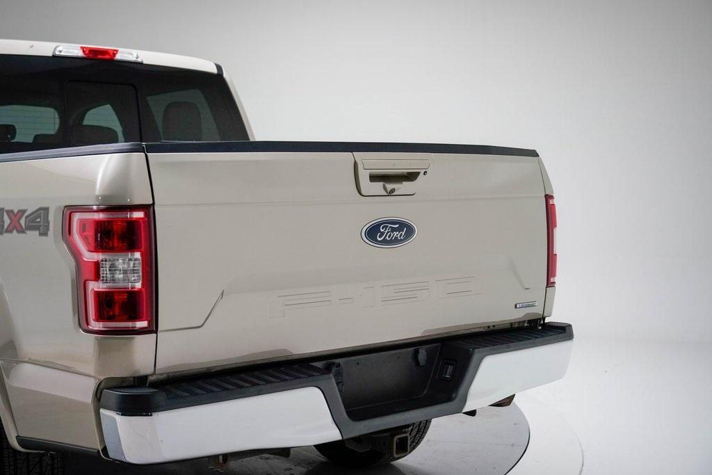 used 2018 Ford F-150 car, priced at $26,639