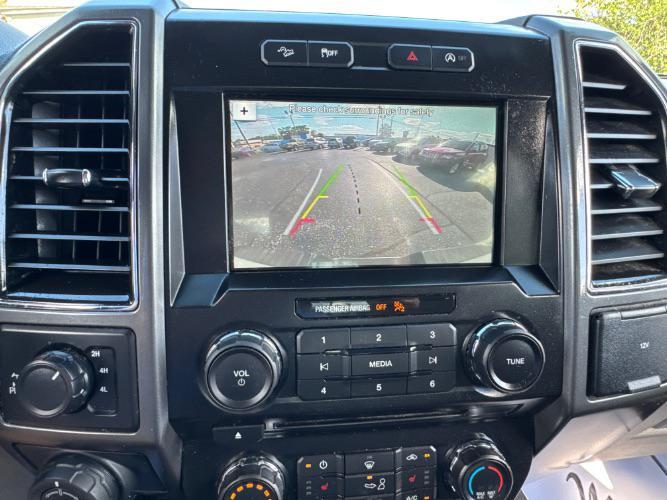 used 2018 Ford F-150 car, priced at $16,988