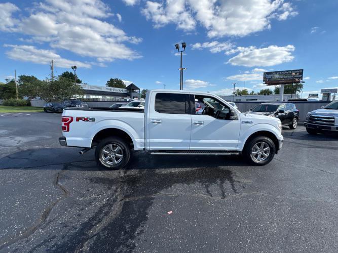 used 2018 Ford F-150 car, priced at $16,988
