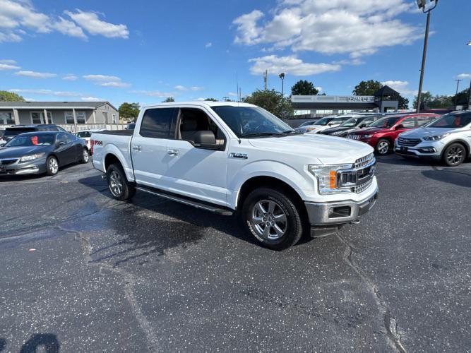 used 2018 Ford F-150 car, priced at $16,988