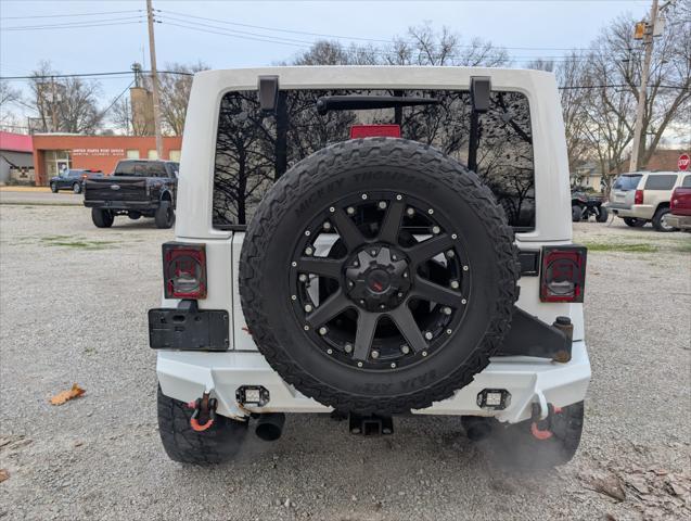 used 2016 Jeep Wrangler Unlimited car, priced at $24,450