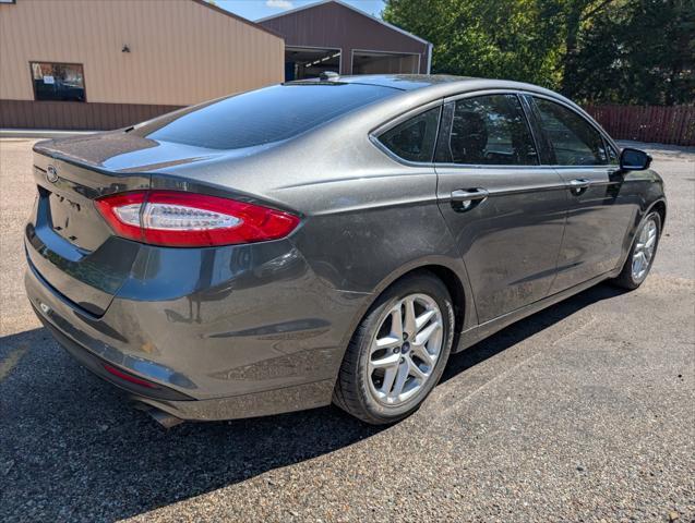 used 2016 Ford Fusion car, priced at $10,300