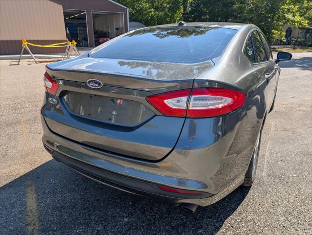 used 2016 Ford Fusion car, priced at $10,300