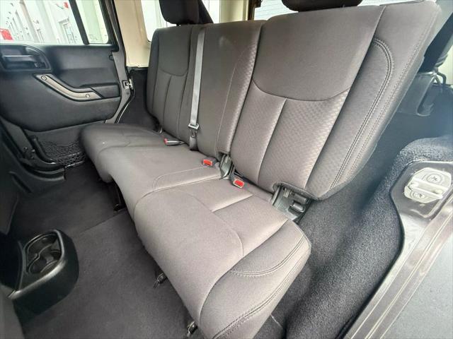 used 2018 Jeep Wrangler JK Unlimited car, priced at $19,497