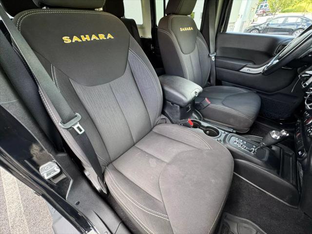 used 2014 Jeep Wrangler Unlimited car, priced at $19,997