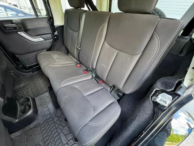 used 2014 Jeep Wrangler Unlimited car, priced at $19,997