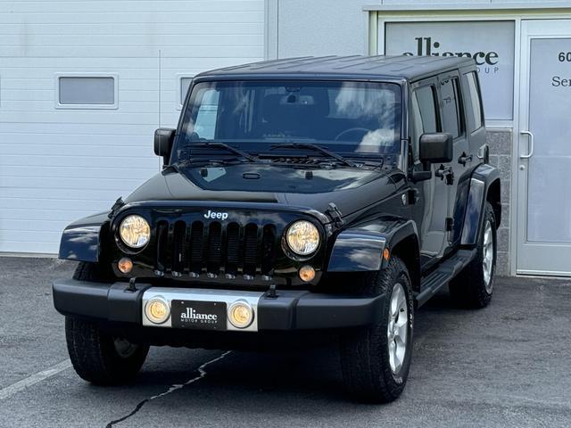 used 2014 Jeep Wrangler Unlimited car, priced at $20,997