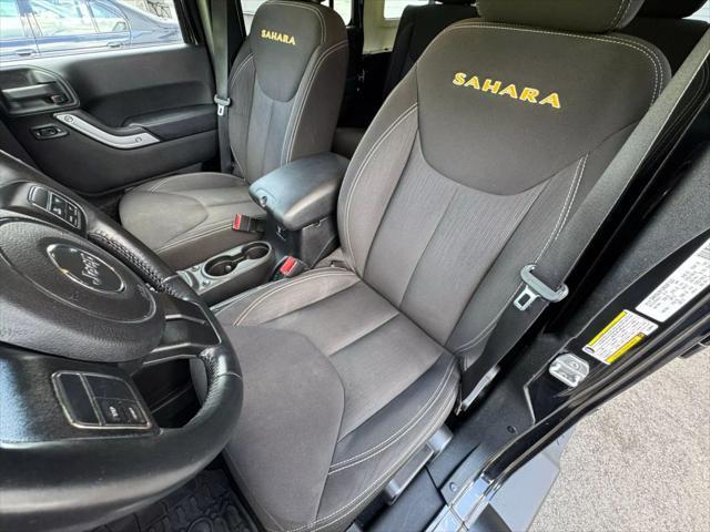 used 2014 Jeep Wrangler Unlimited car, priced at $19,997