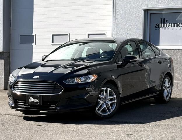 used 2016 Ford Fusion car, priced at $9,997