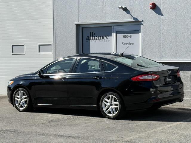 used 2016 Ford Fusion car, priced at $9,997