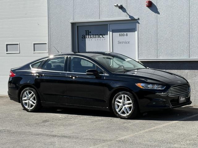 used 2016 Ford Fusion car, priced at $9,997