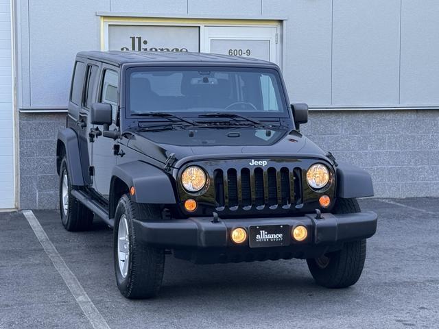 used 2018 Jeep Wrangler JK Unlimited car, priced at $19,497