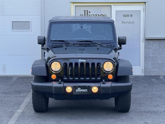 used 2018 Jeep Wrangler JK Unlimited car, priced at $19,497