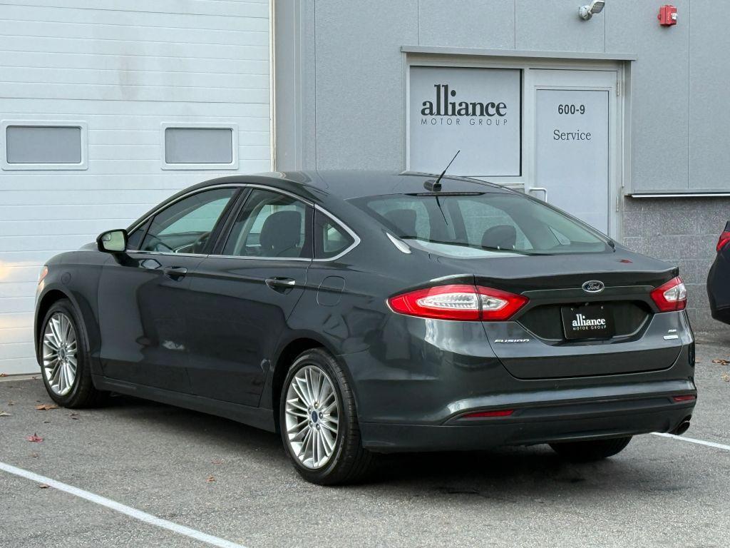 used 2015 Ford Fusion car, priced at $9,997