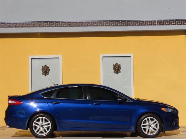 used 2015 Ford Fusion car, priced at $7,900