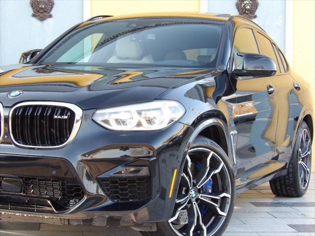 used 2021 BMW X4 M car, priced at $48,900