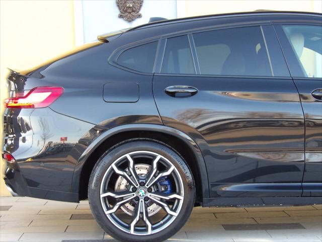 used 2021 BMW X4 M car, priced at $48,900